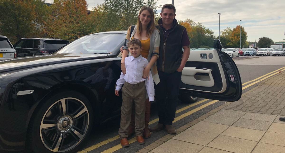 Jamie in front of Rolls Royce
