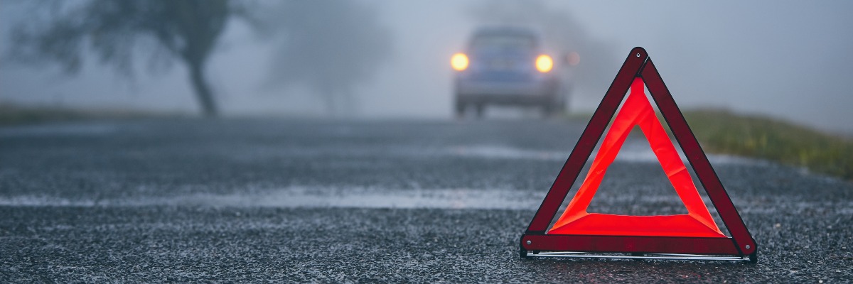 long-distance driving tips - pack a red warning triangle