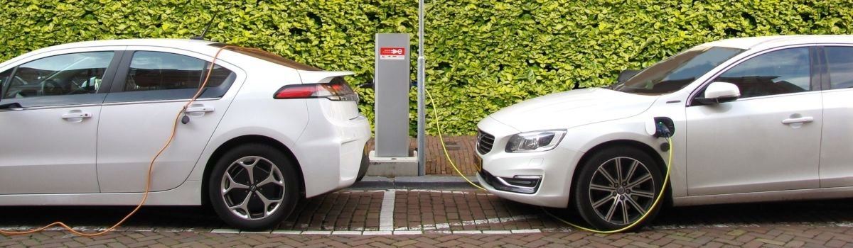 cars at a charging station
