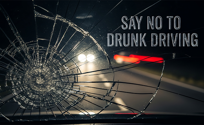 Say No to Drunk Driving Written on a smashed windscreen