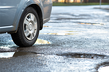 The Ultimate Guide to Avoiding and Reporting Potholes