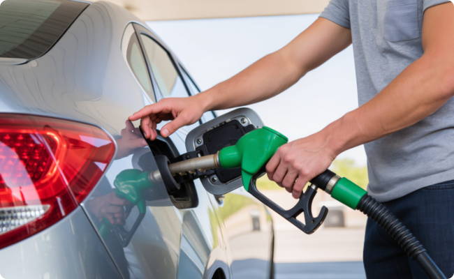 Person Putting Petrol in Their Car